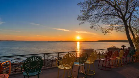 Photoreal Memorial Union Terrace looking over Lake Mendota at sunset
