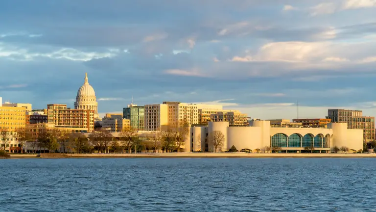 Photoreal Lake Monona shoreline, Monona Terrace, and Capitol dome in late-afternoon light