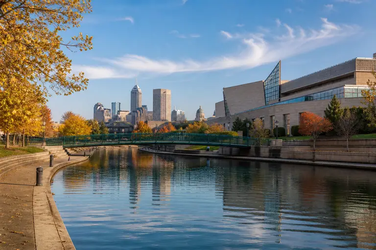 Photoreal Indianapolis canal and downtown skyline in late afternoon