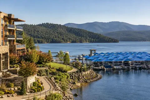 Photoreal editorial image for Where to Stay in Coeur d’Alene: Waterfront or Riverstone?, inspired by Coeur d’Alene