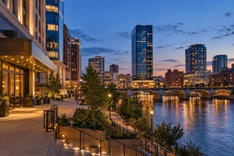 Photoreal Grand Rapids editorial scene for Where to Stay in Grand Rapids for a Weekend: Downtown, Eastown, or the West Side?