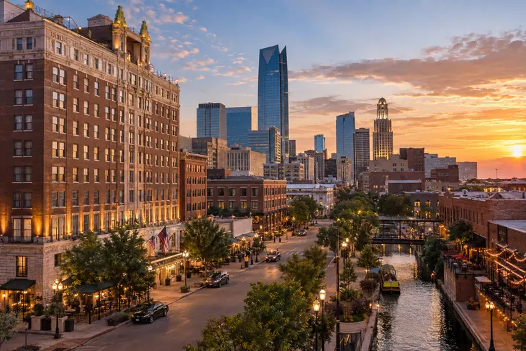 Photoreal editorial image for Where to Stay in Oklahoma City: Downtown, Bricktown, or Paseo?, set in Oklahoma City, Oklahoma
