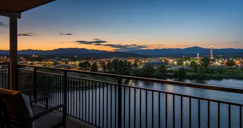 Photoreal editorial image for Where to Stay in Pigeon Forge: The Island, Old Mill, or Dollywood?