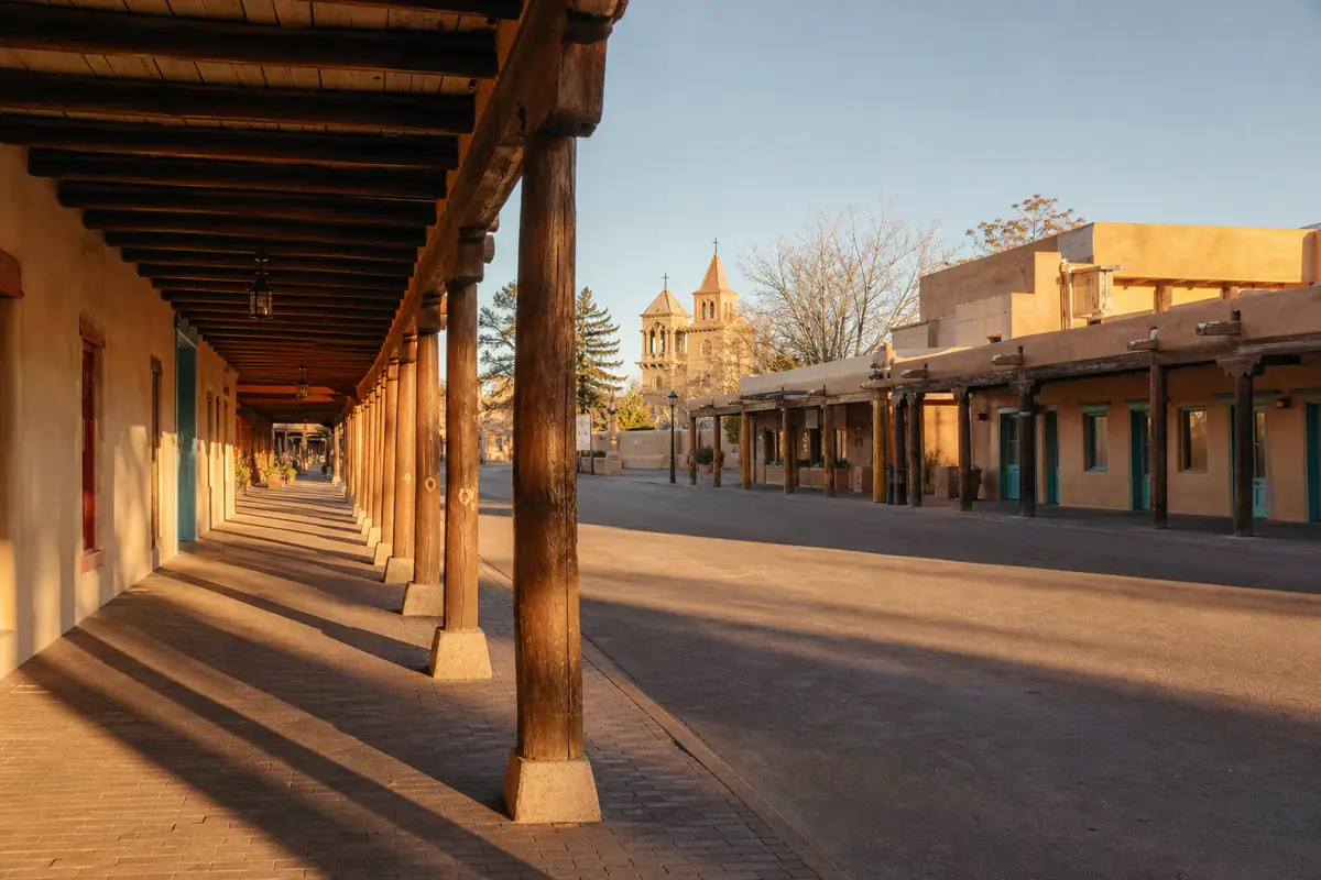 Photoreal travel-editorial view of Old Town Albuquerque in Albuquerque, New Mexico