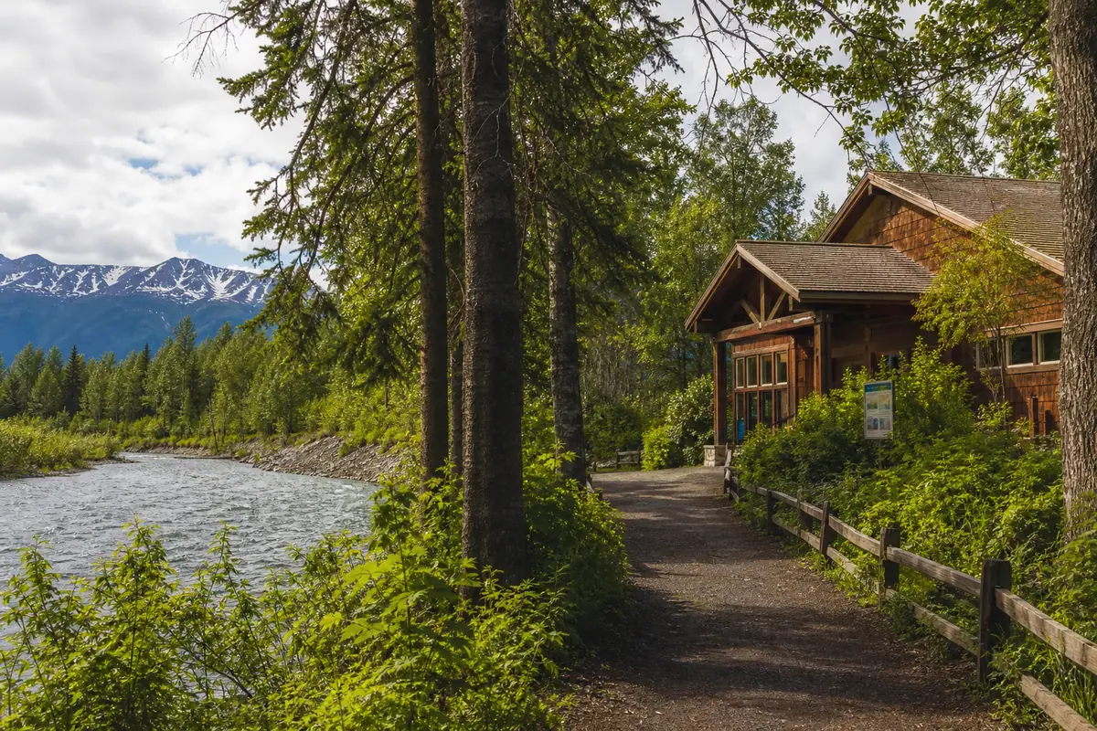 Photoreal travel-editorial view of Eagle River Nature Center in Anchorage, Alaska