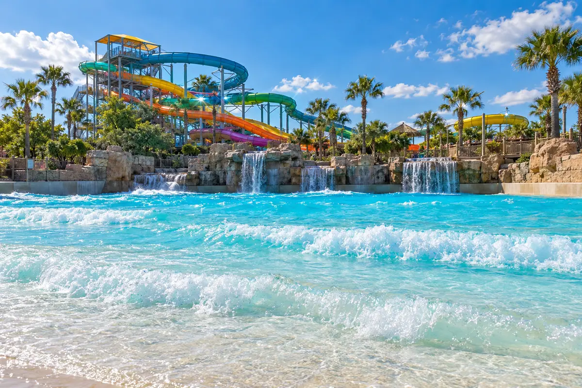 Photoreal travel-editorial view of Six Flags Hurricane Harbor Arlington in Arlington, Texas
