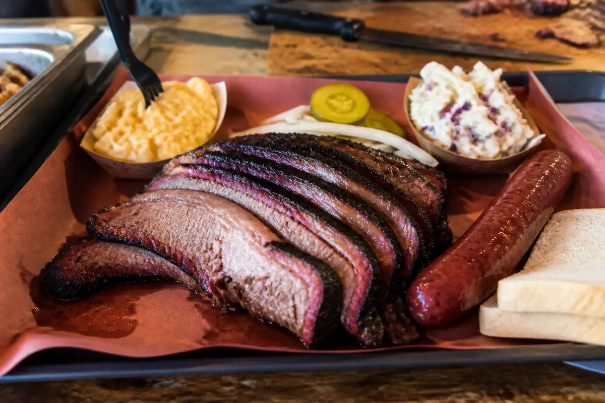 Photoreal dining or food scene representing Franklin Barbecue in Austin