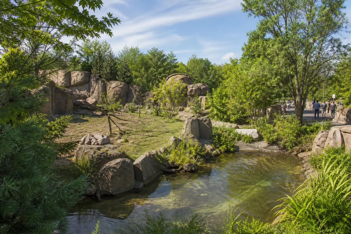 Photorealistic travel-editorial view of Columbus Zoo and Aquarium in Columbus, Ohio