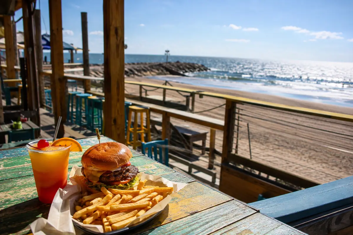 Photoreal travel-editorial view of The Spot in Galveston, Texas
