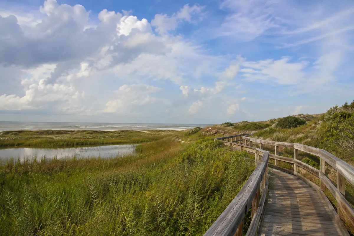 Photoreal travel-editorial view of Moody Gardens in Galveston, Texas