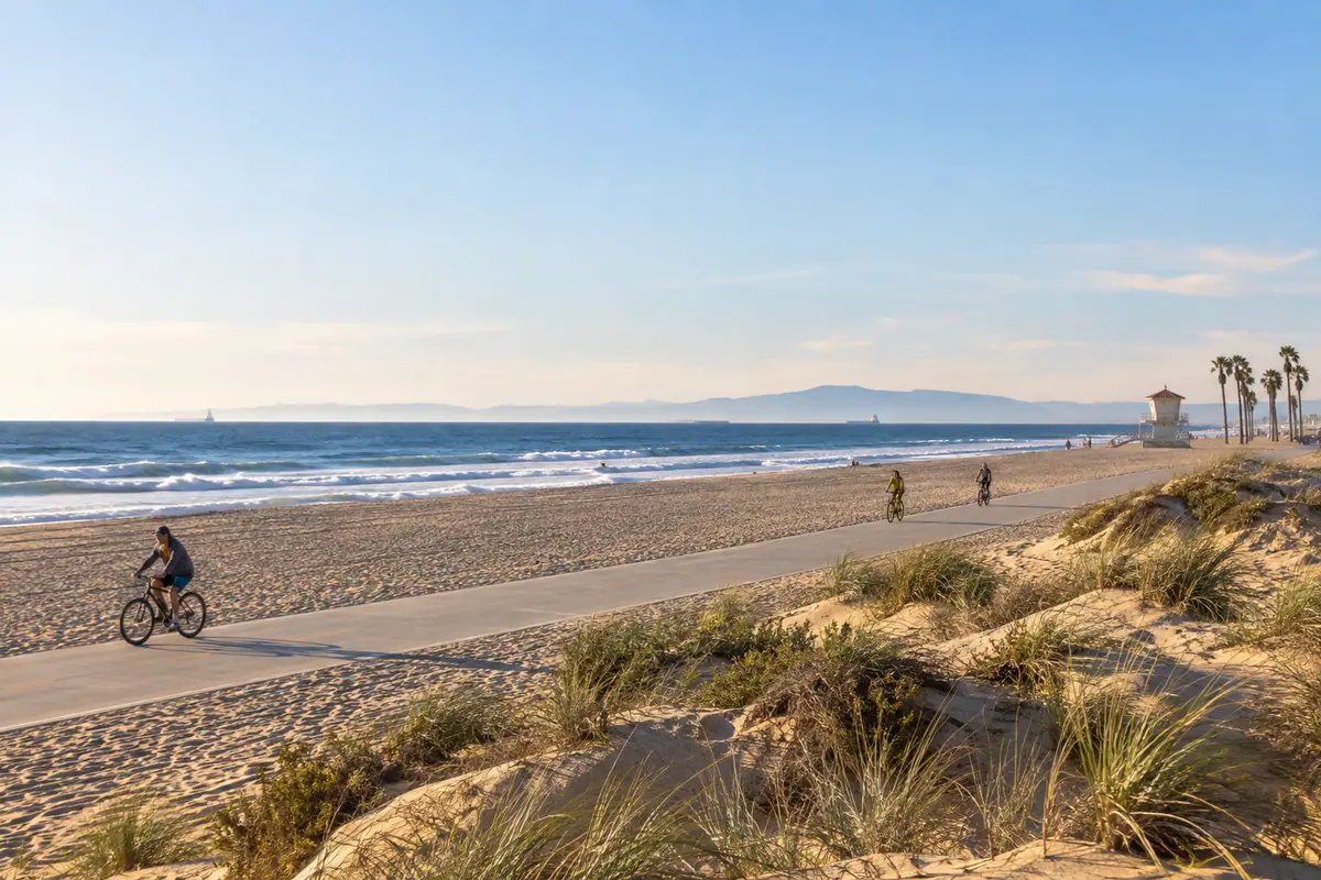 Photoreal travel-editorial view of Huntington State Beach in Huntington Beach, California