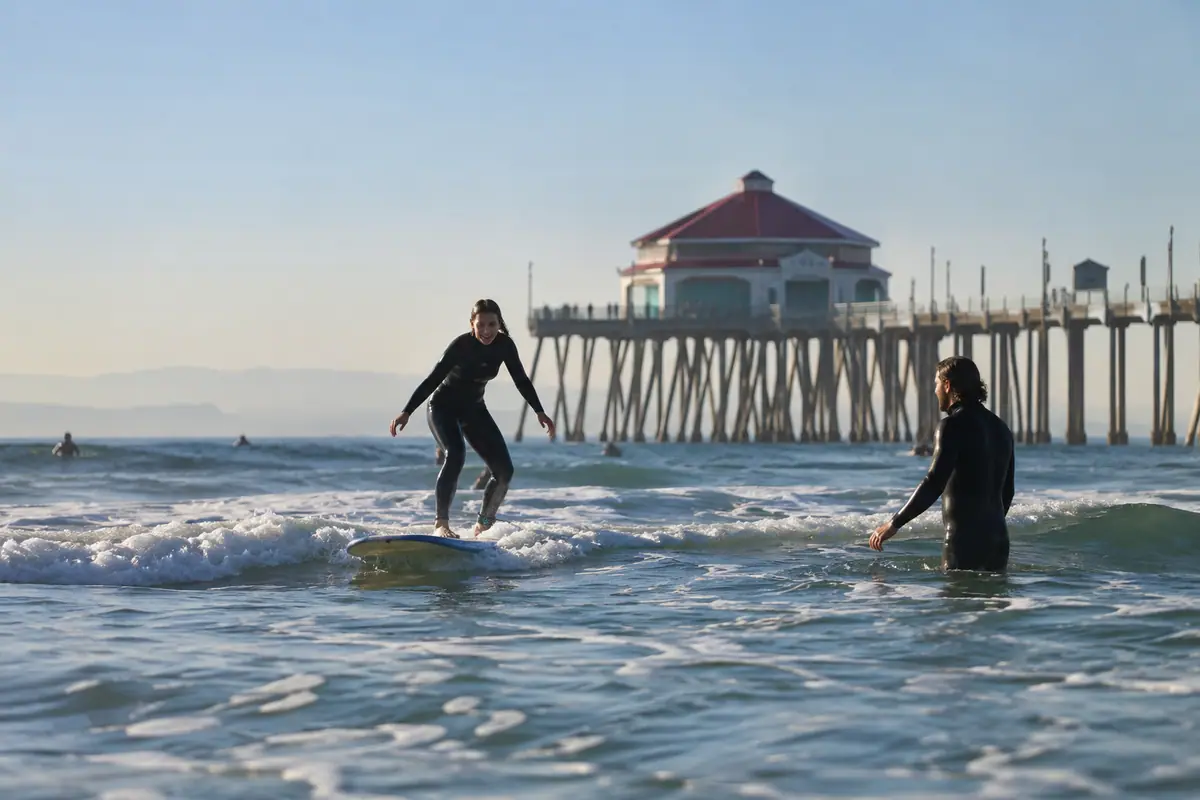 Photoreal travel-editorial view of Surf Lesson at Huntington Beach in Huntington Beach, California