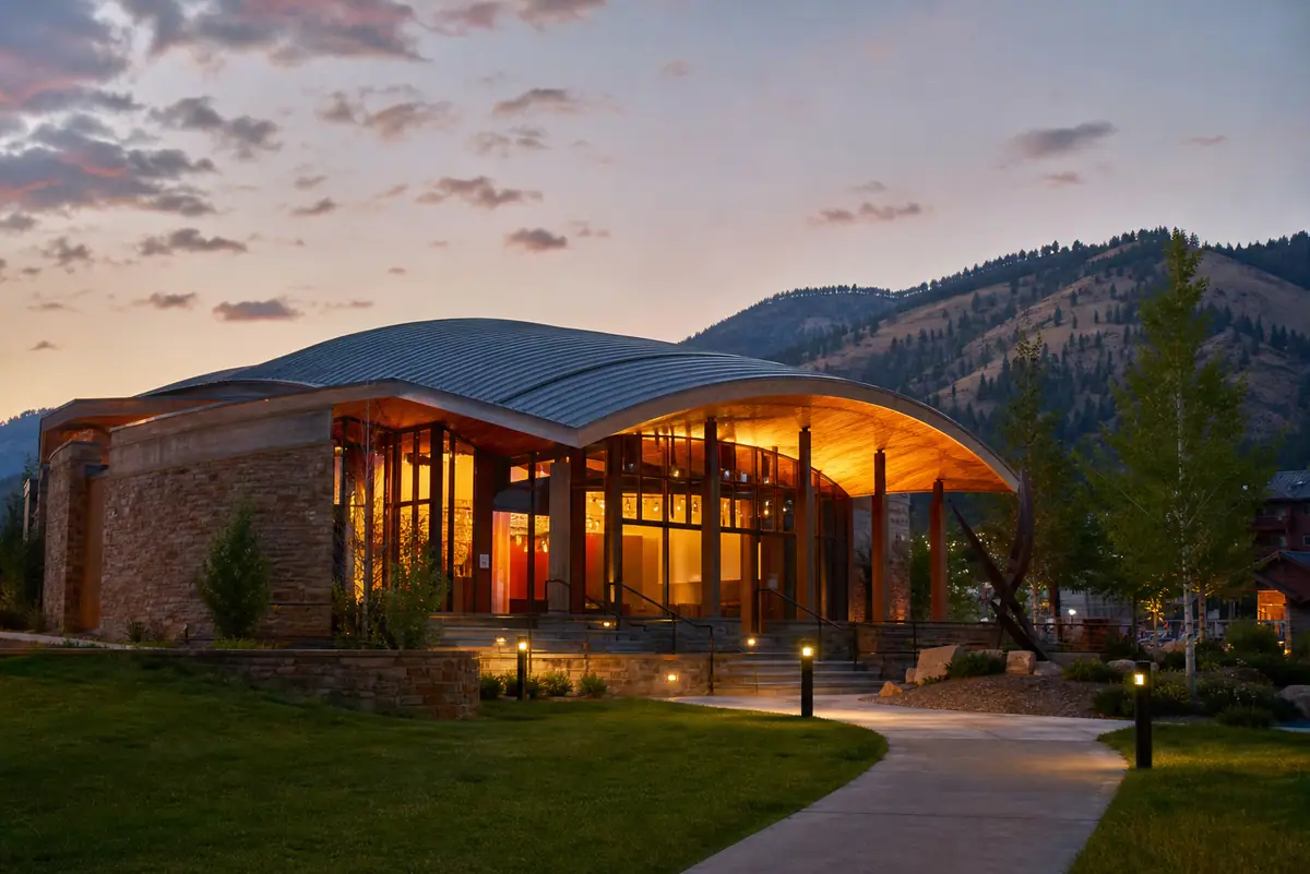 Photorealistic travel-editorial view of Center for the Arts in Jackson, Wyoming