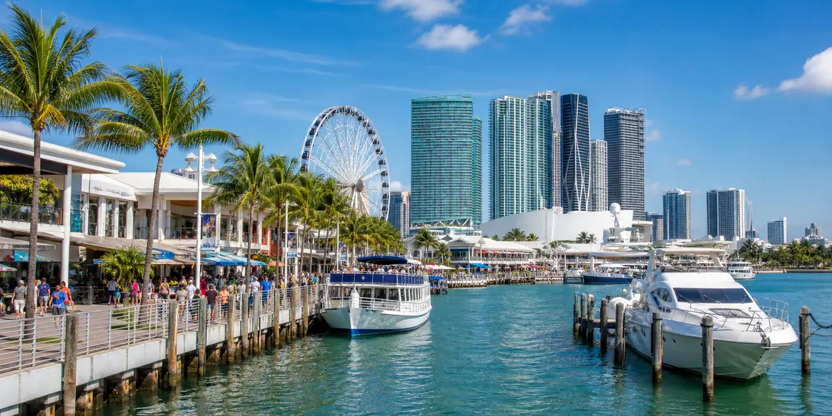 Photoreal Bayside Marketplace marina and Biscayne Bay cruise scene in Miami daylight