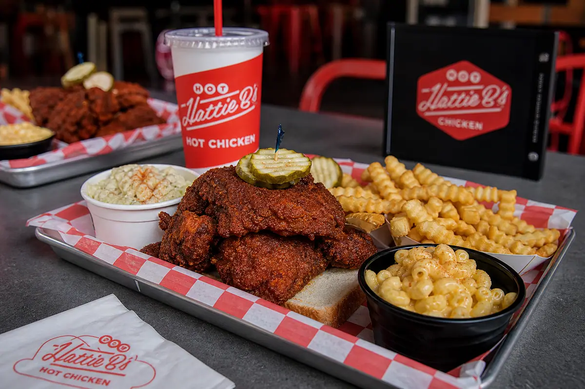 Photoreal Nashville hot chicken tray representing Hattie B's Hot Chicken