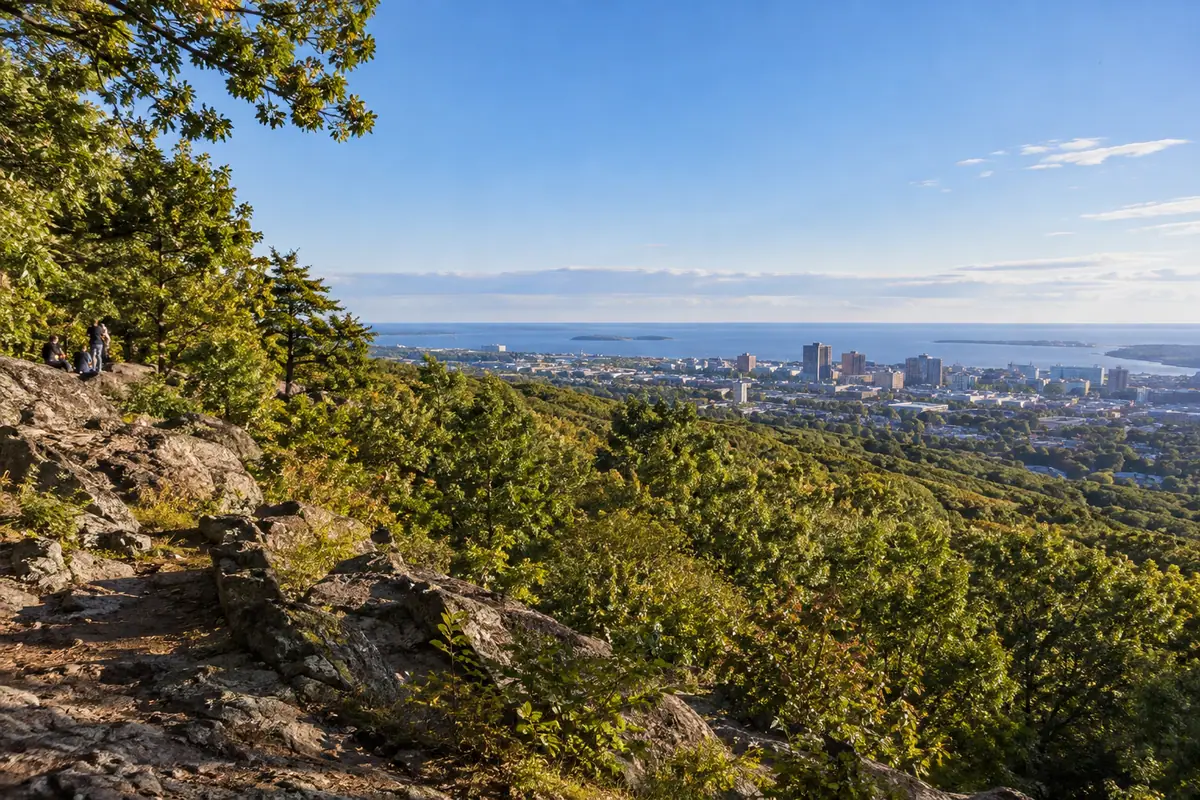 Photoreal travel-editorial view of West Rock Ridge State Park in New Haven, Connecticut