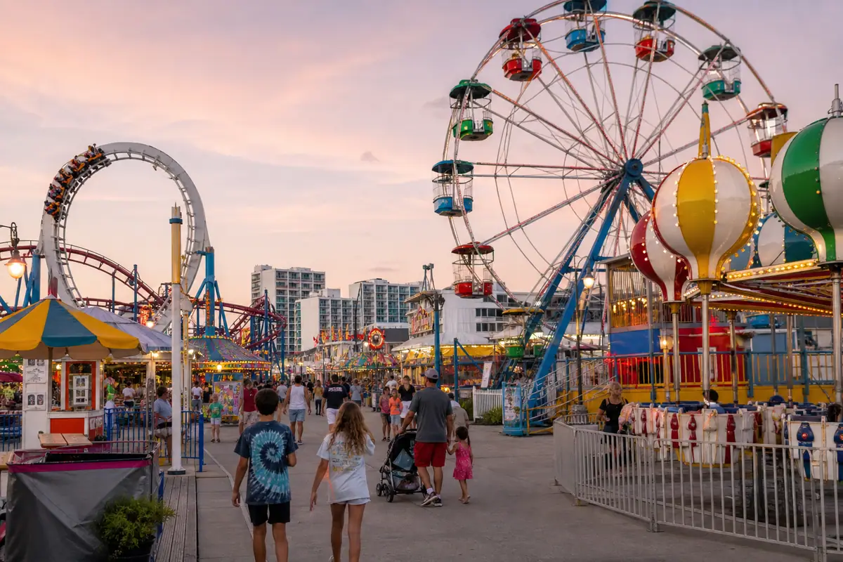 Photoreal Jolly Roger Amusement Park rides in Ocean City at dusk