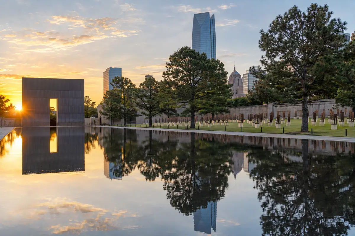 Photoreal travel-editorial view of Oklahoma City National Memorial & Museum in Oklahoma City, Oklahoma