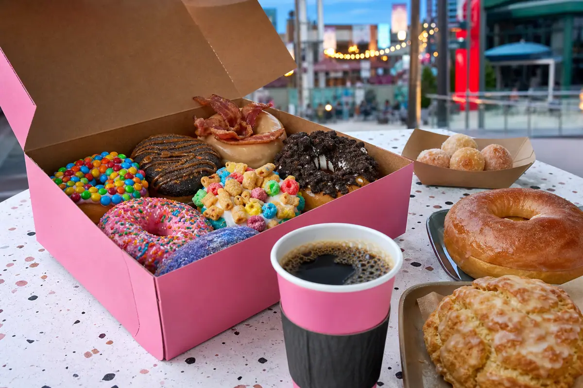 Photoreal doughnuts and coffee representing Voodoo Doughnut at Universal CityWalk Orlando