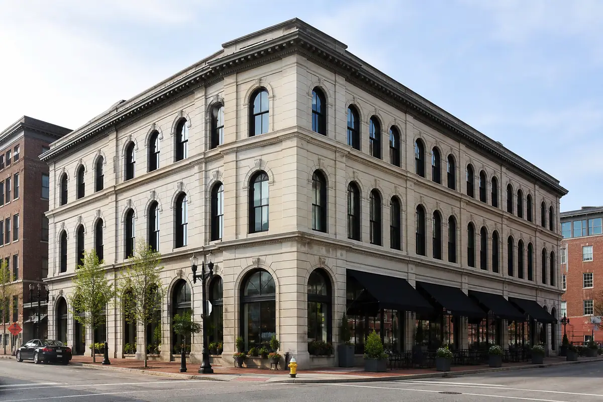 Photoreal exterior or public-space view of The Press Hotel in Portland, Maine