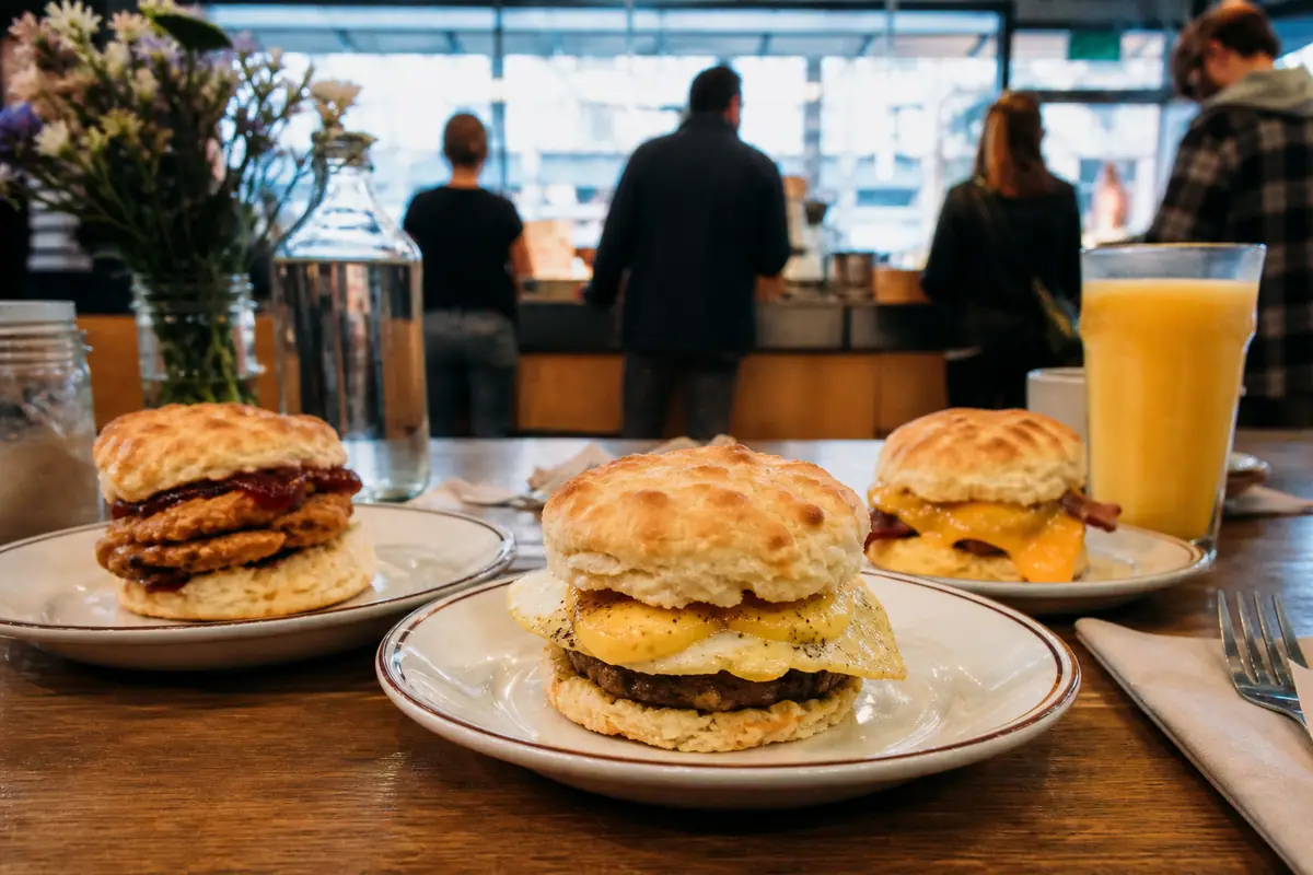 Photoreal dining or food scene representing Pine State Biscuits in Portland