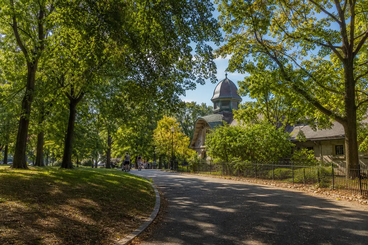 Photoreal travel-editorial view of Roger Williams Park and Zoo in Providence, Rhode Island