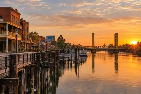 Historic Old Sacramento waterfront beside the Sacramento River at sunset