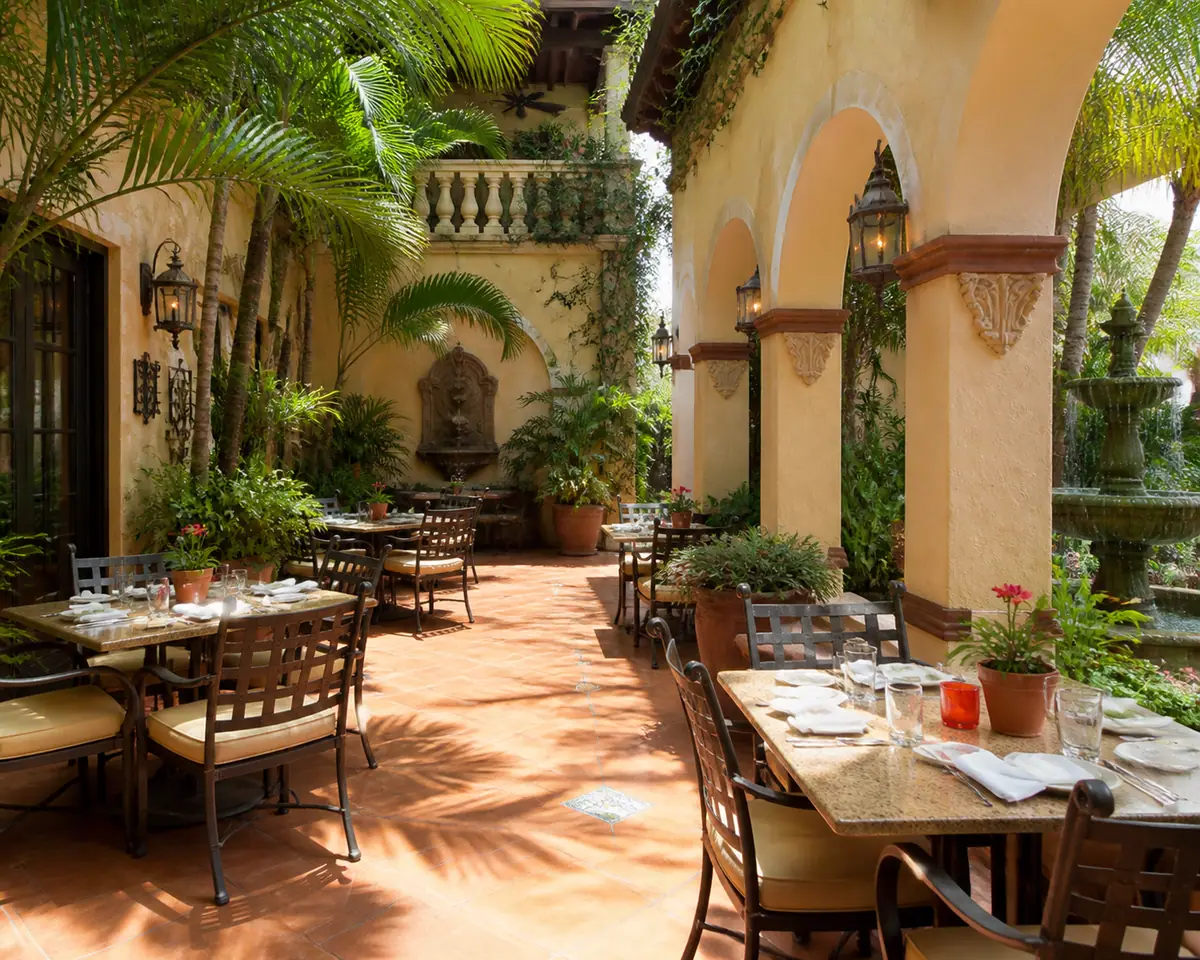 Photoreal travel-editorial view of Columbia Restaurant St. Armands Circle in Sarasota, Florida
