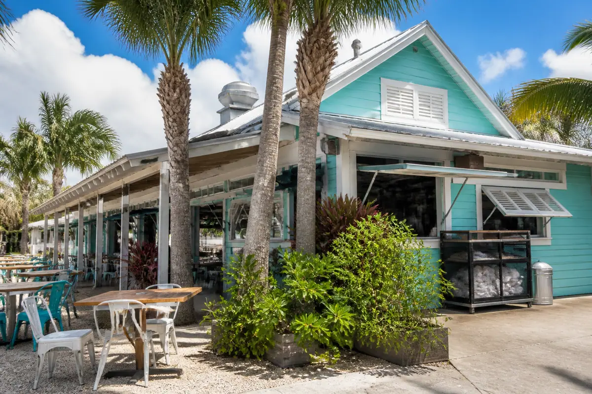 Photoreal travel-editorial view of Walt’s Fish Market in Sarasota, Florida