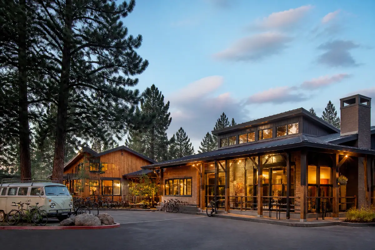 Photorealistic travel-editorial view of Basecamp Tahoe South in South Lake Tahoe, California