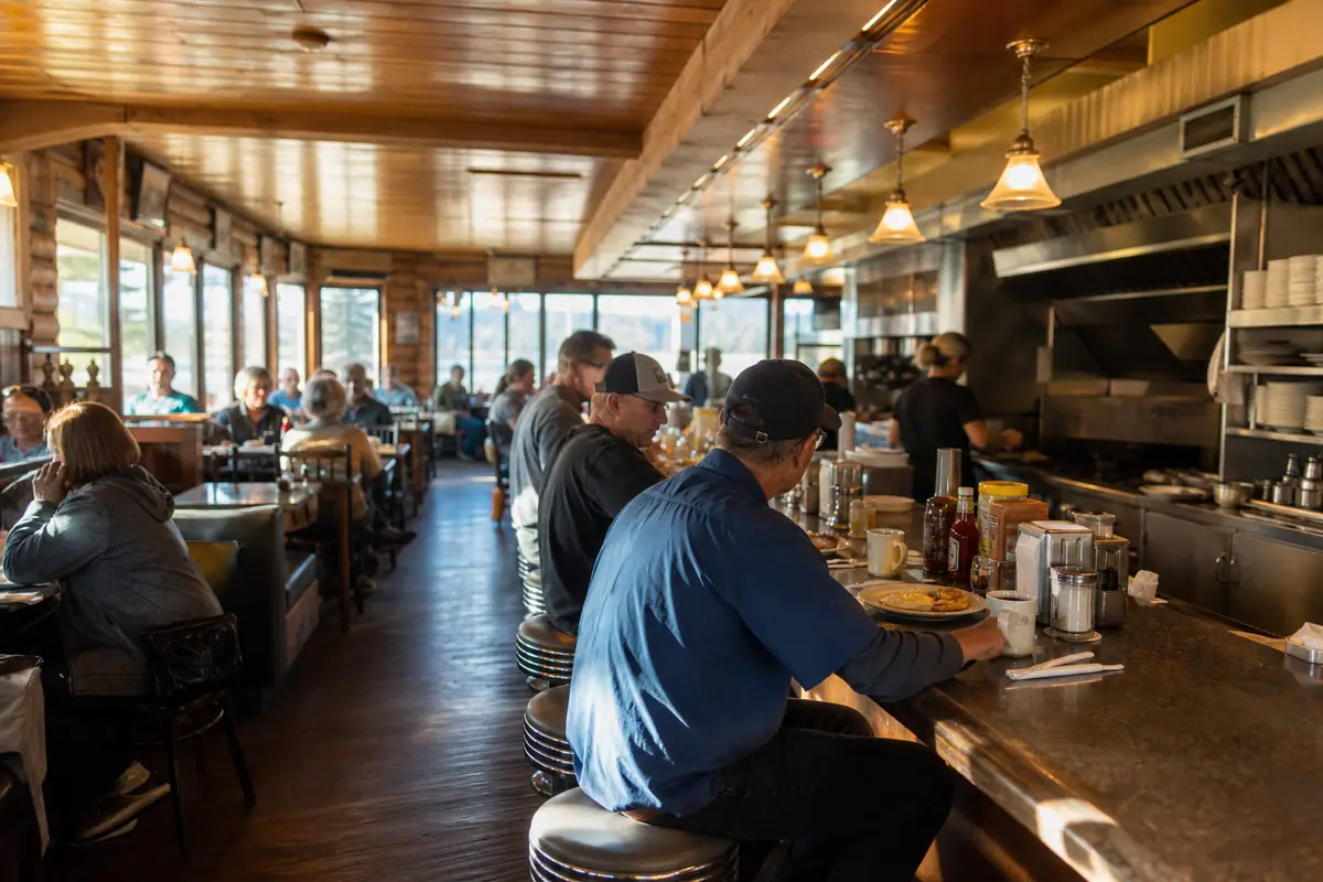 Photorealistic travel-editorial view of Ernie's Coffee Shop in South Lake Tahoe, California