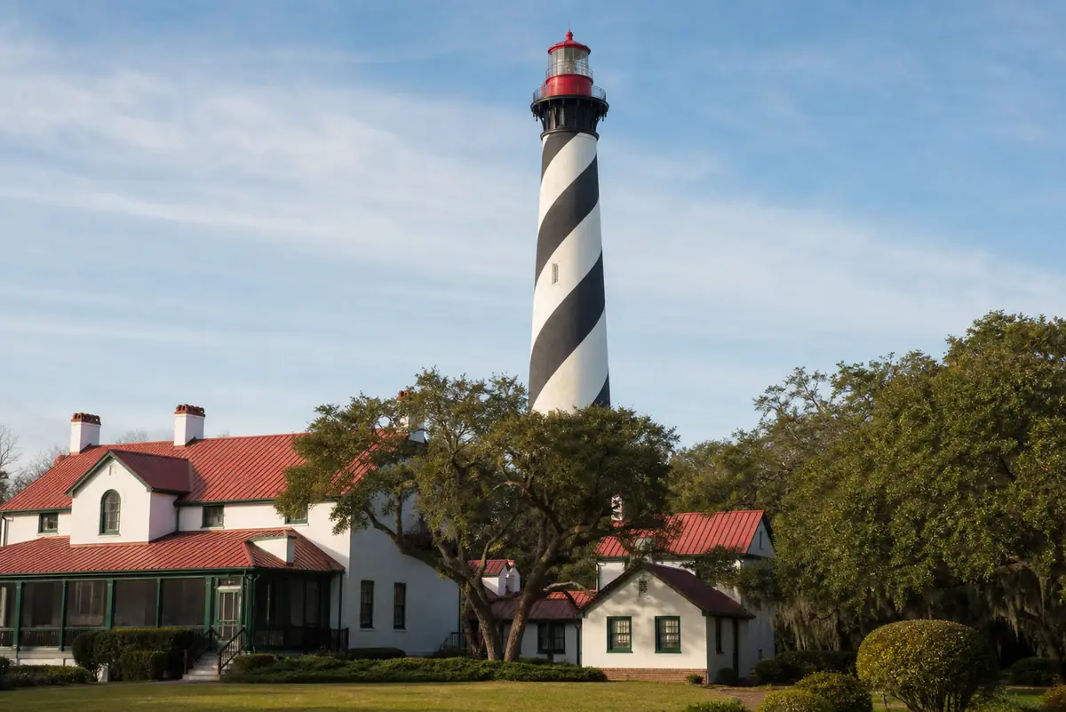 Photoreal travel-editorial view of St. Augustine Lighthouse & Maritime Museum in St. Augustine, Florida