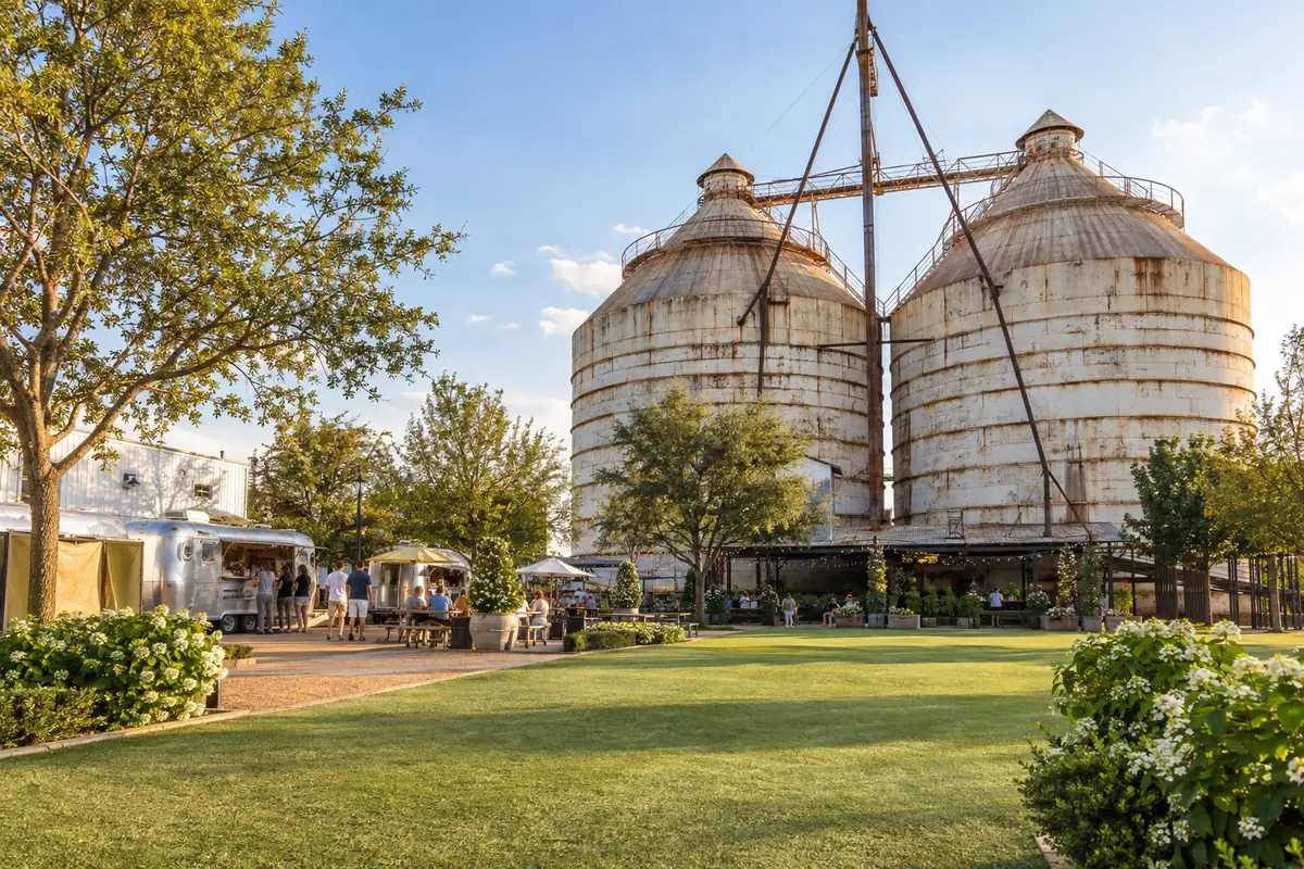 Photoreal travel-editorial view of Magnolia Market at the Silos in Waco, Texas