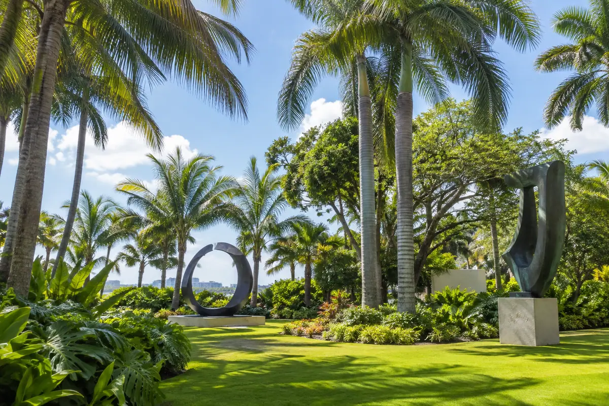 Photoreal travel-editorial view of Ann Norton Sculpture Gardens in West Palm Beach, Florida